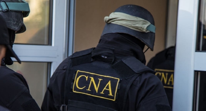 Șase polițiști reținuți într-un caz de corupție